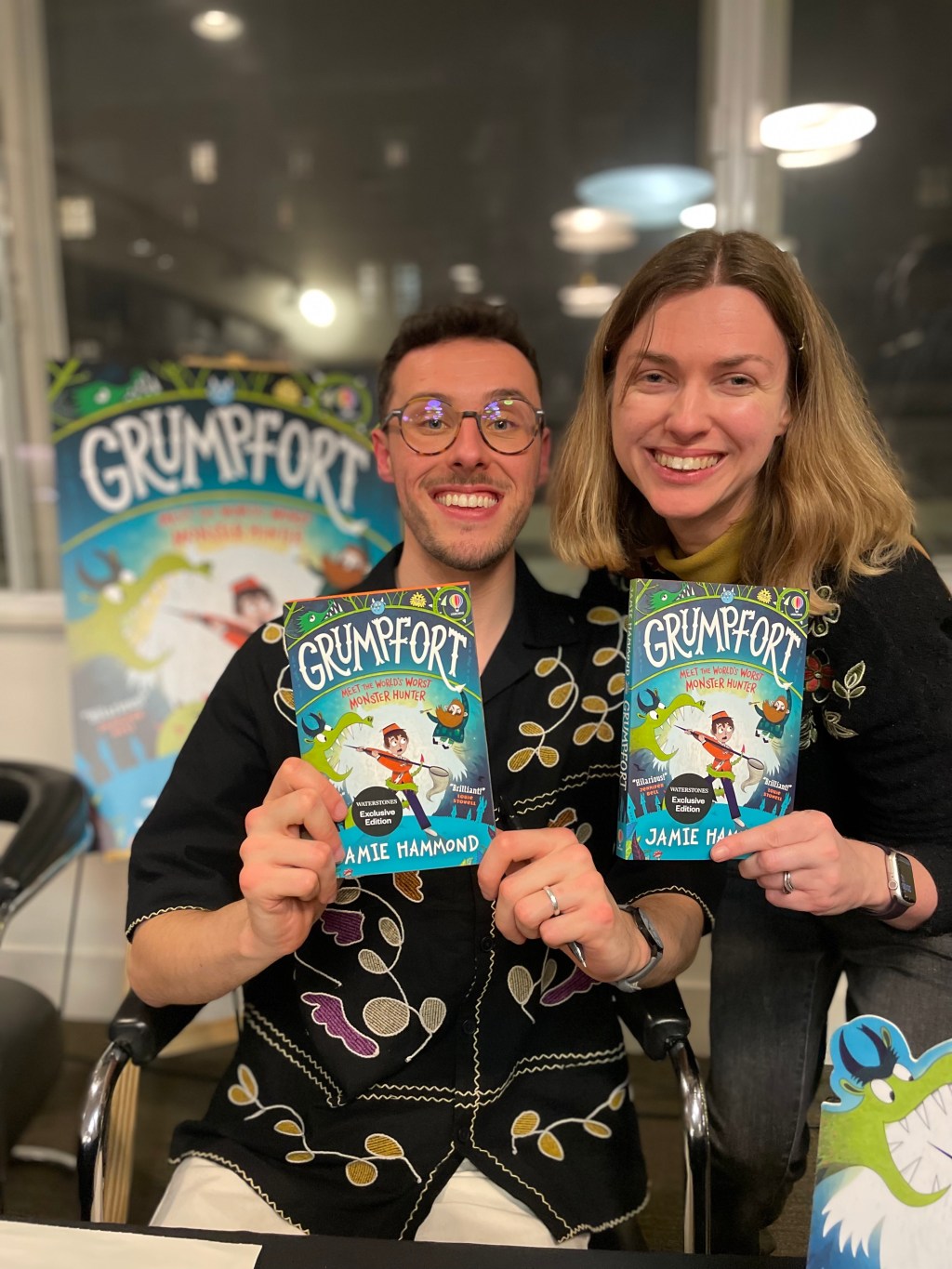 Jamie Hammond (author) holding a copy of Grumpfort, next to me, also holding a copy of the book